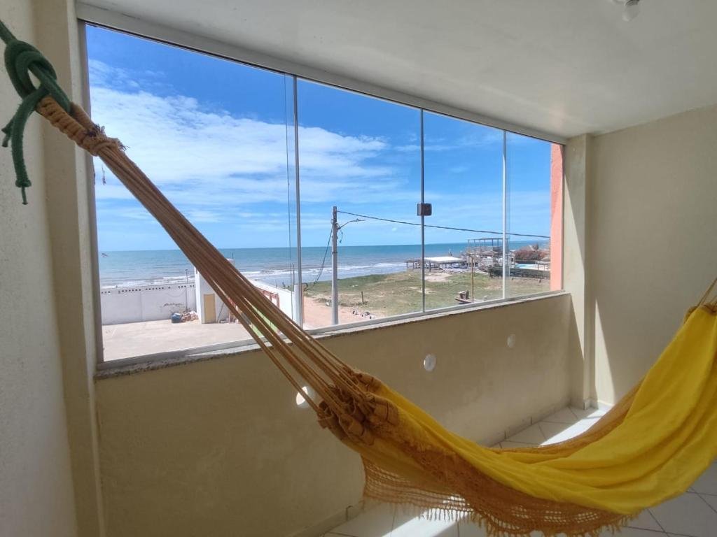 Hammock on a balcony with sea view