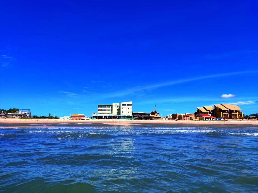 View of the hotel and the beach of Tibau from the sea